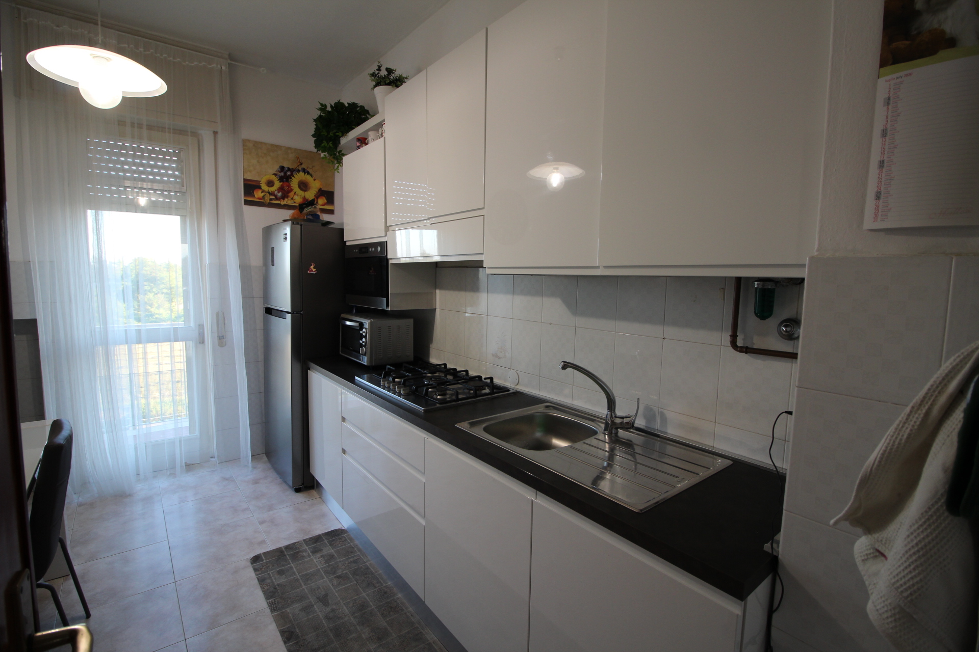 APPARTAMENTO DI TRE LOCALI CUCINA E BOX ARREDATO