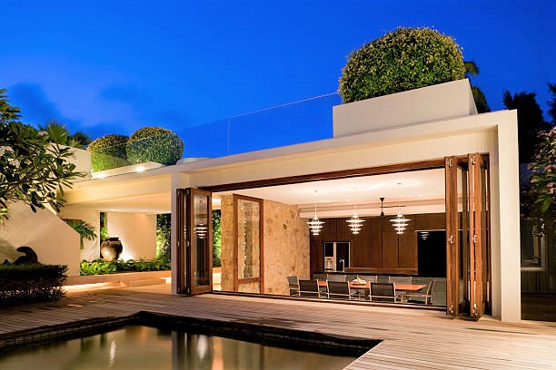 Luxury Tropical Modern Island Home Exterior With Swimming Pool.